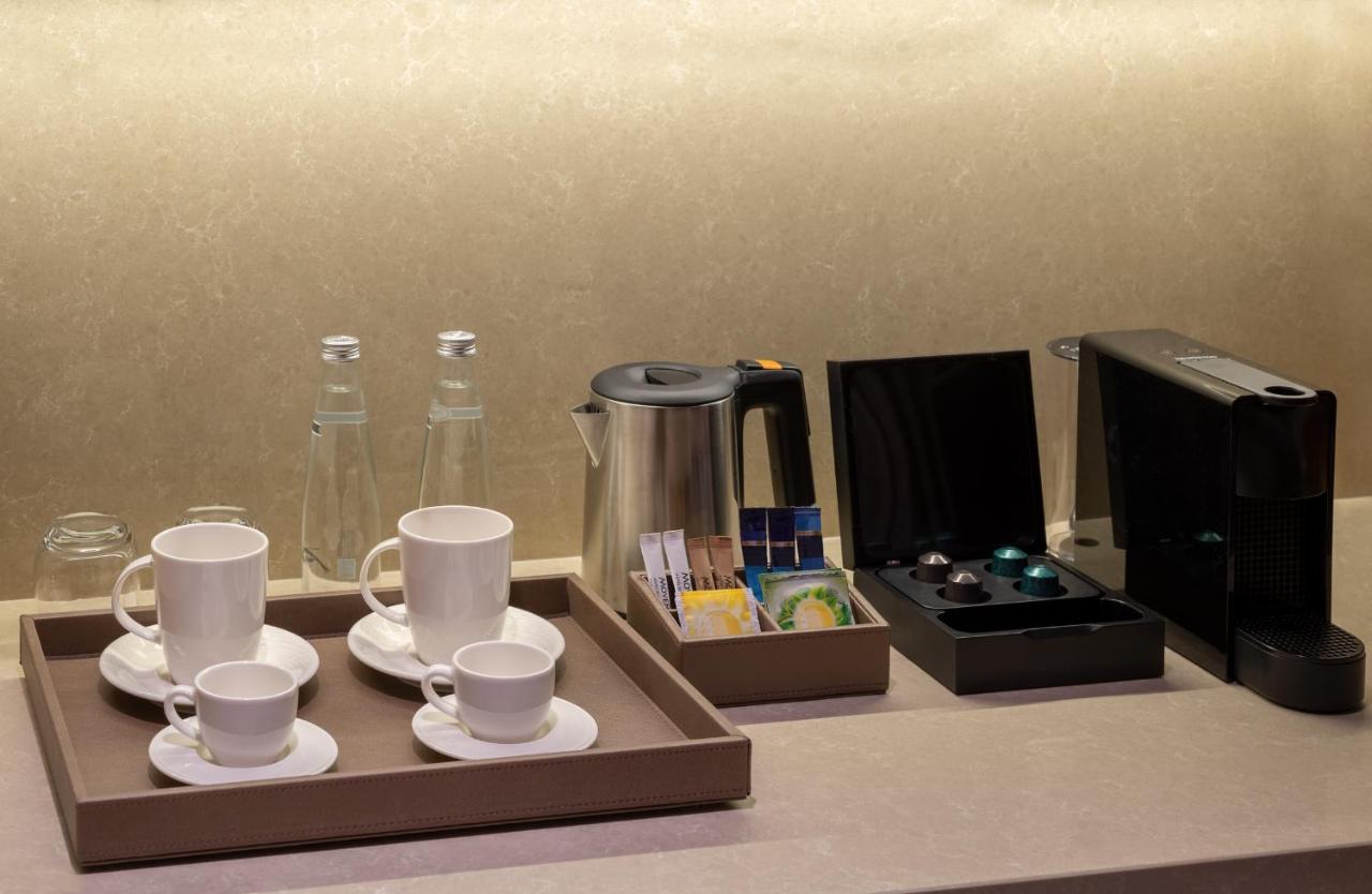 Moevenpick Hotel Istanbul Asia Airport Luaran gambar A Nespresso machine in a hotel room